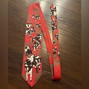 Wally Wear red polyester necktie featuring a cow motif, funny novelty western